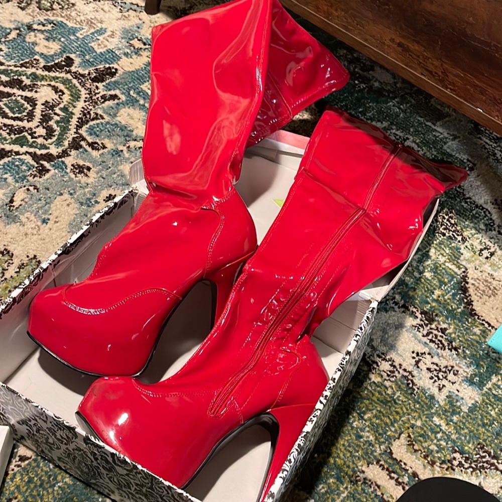 Red patent leather over the knee patent boots